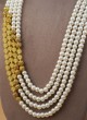 Four Layered Mala In White And Yellow Color